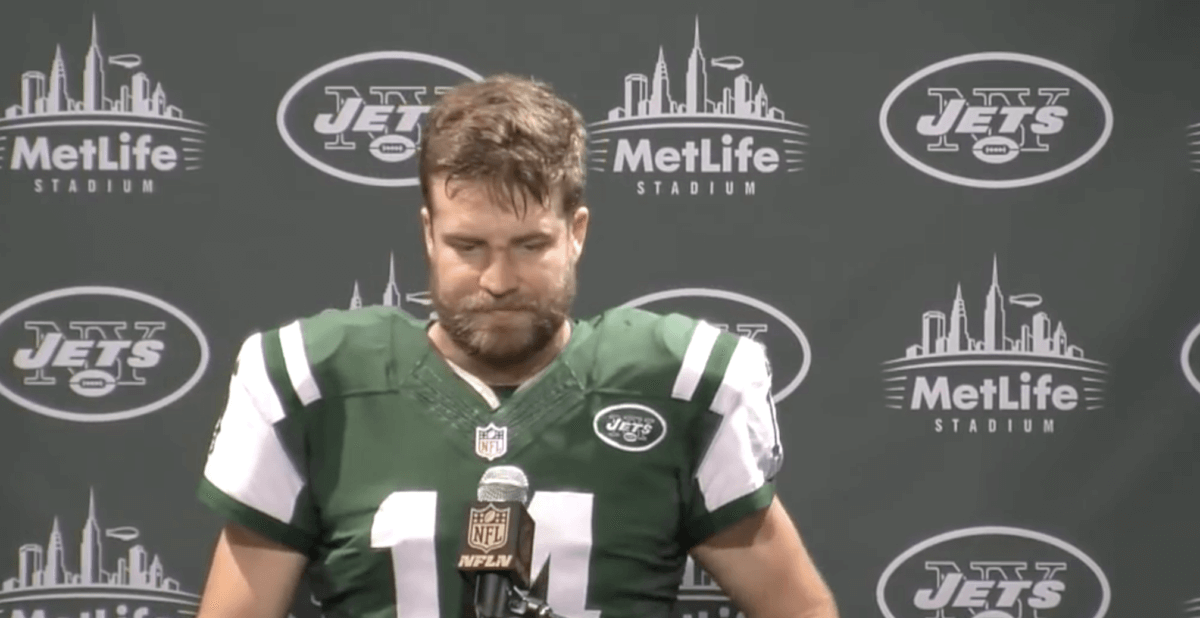Ryan Fitzpatrick speaks to the press after a Jets game in 2015.
