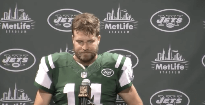 Ryan Fitzpatrick speaks to the press after a Jets game in 2015.