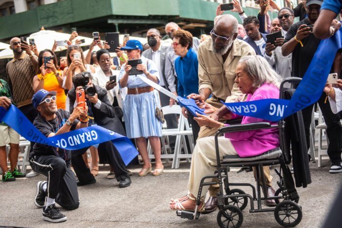 Director Spike Lee (left), take a photo of Rachel Robinson, the widow of Jackie Robinson, at the opening of the new museum on July 26.