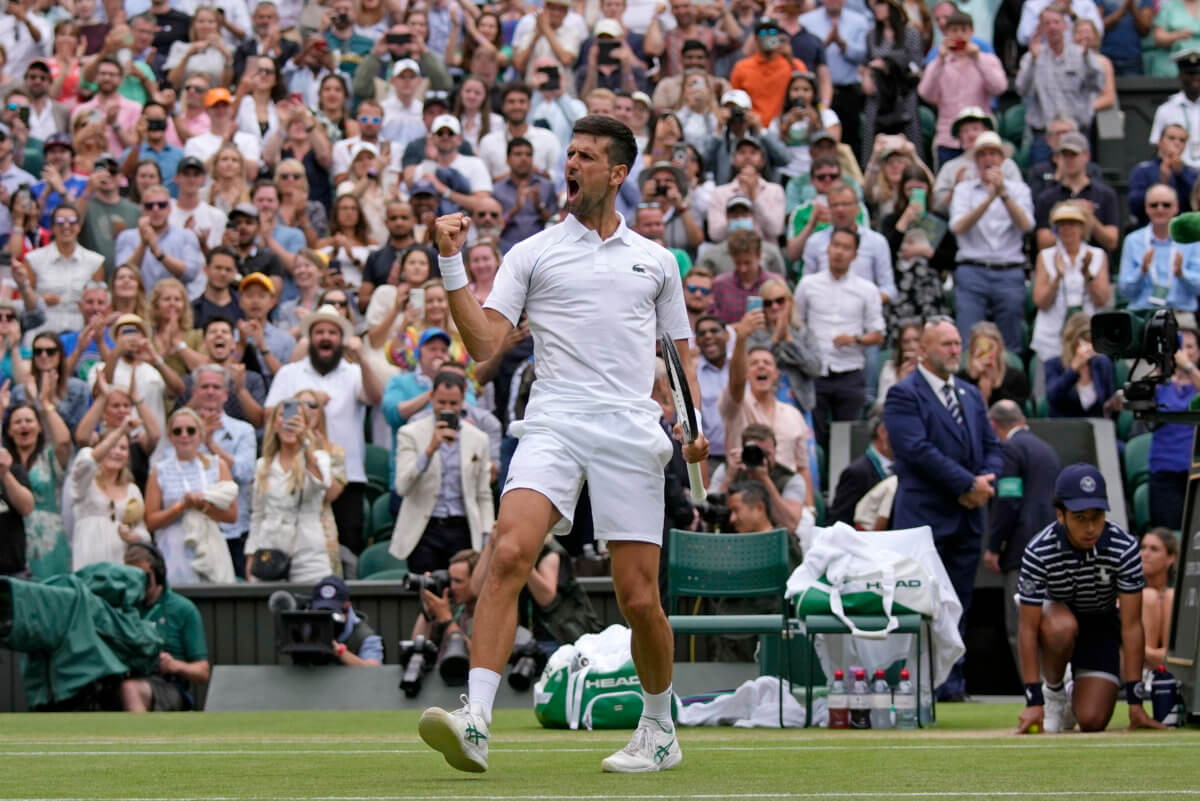 Novak Djokovic celebrates his win over Jannik Sinner.