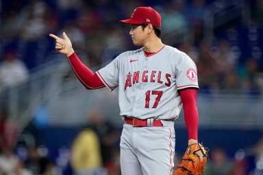 Angels starting pitcher Shohei Ohtani gestures on the mound.