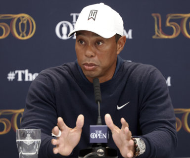 Tiger Woods speaks during a press conference.