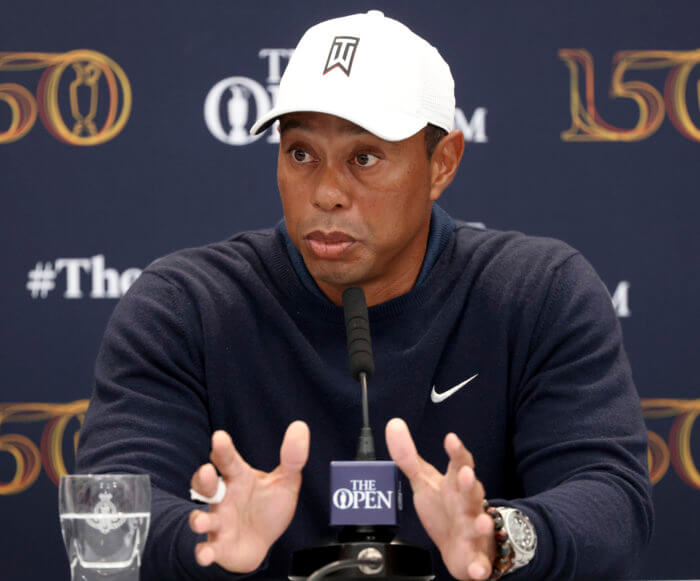 Tiger Woods speaks during a press conference.