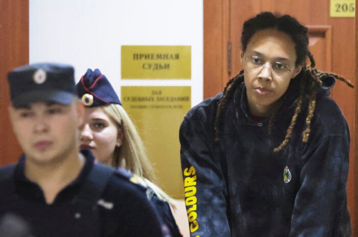 WNBA star and two-time Olympic gold medalist Brittney Griner is escorted to a courtroom for a hearing, in Khimki just outside Moscow, Russia, Monday, July 25, 2022. American basketball star Brittney Griner returns Tuesday to a Russian courtroom for her drawn-out trial on drug charges that could bring her 10 years in prison if convicted.