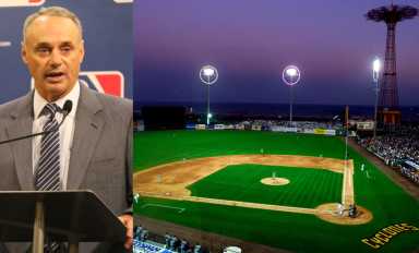 Rob Manfred (left) defended the pay scale for minor league players.