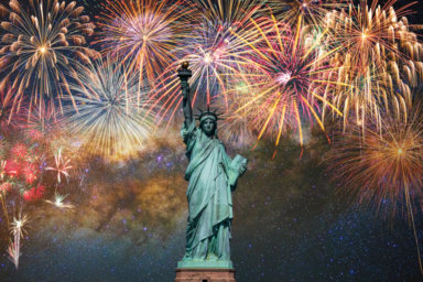 Statue of Liberty over the Multicolor Fireworks Celebrate with the milky way background, 4th of July and Independence day concept
