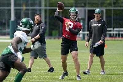 New York Jets quarterback Zach Wilson takes part in drills at the NFL football team's practice facility.