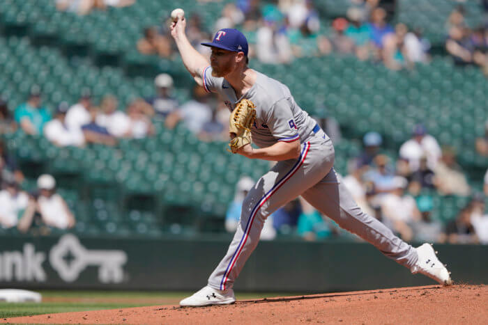 Jon Gray delivers a pitch in 2022 MLB action