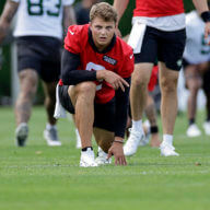 Jets quarterback Zach Wilson takes part in drills at the NFL football team's practice facility.