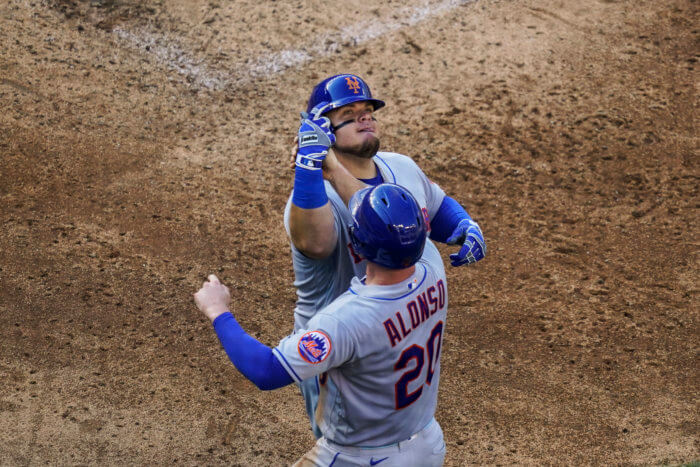 Mets' Daniel Vogelbach, celebrates his grand slam with Pete Alonso during the 5th inning.