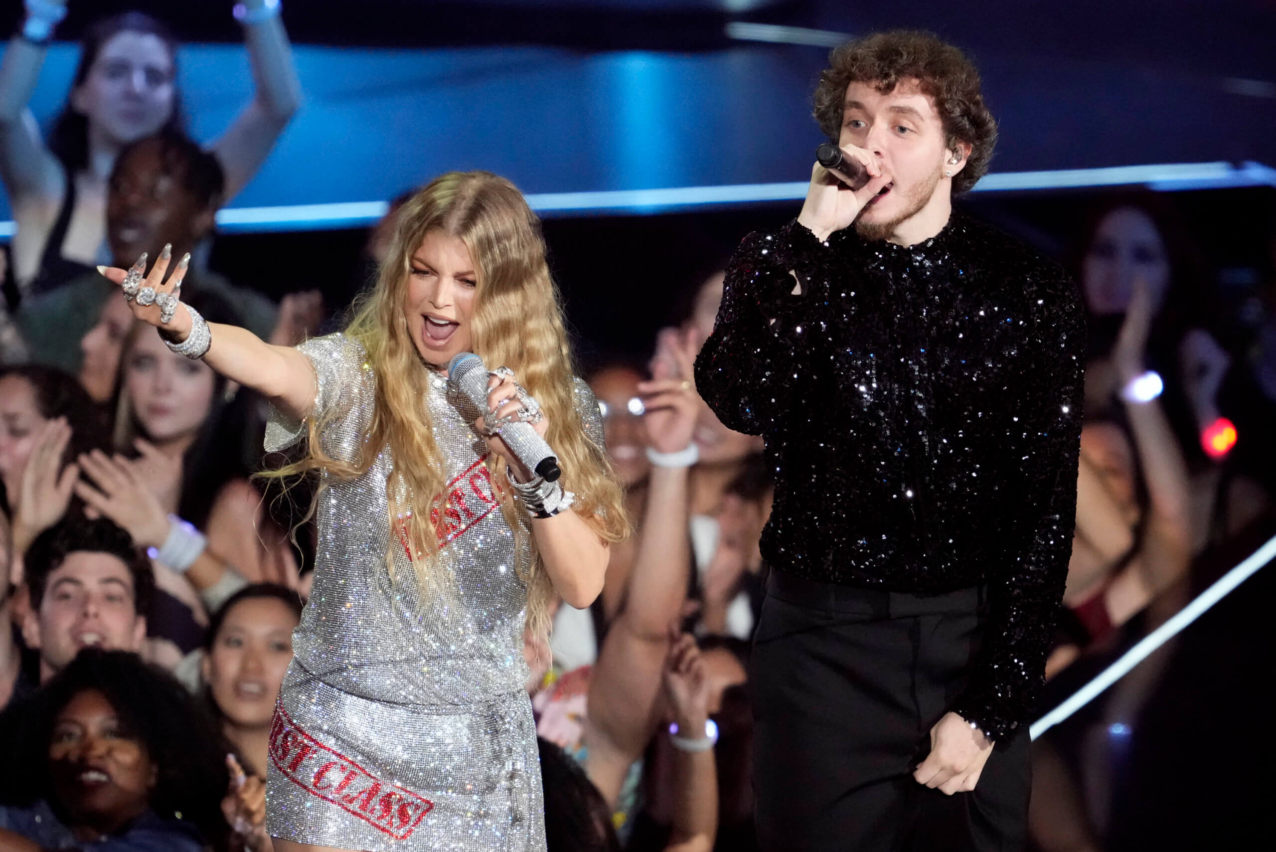 Taylor Swift wins top prize, announces new album at MTV VMAs 2