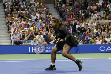 Serena Williams, of the United States, reacts during the first round of the US Open tennis championships against Danka Kovinic, of Montenegro.