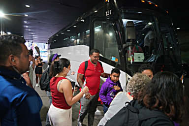 Migrants arrive on bus at Port Authority Bus Terminal