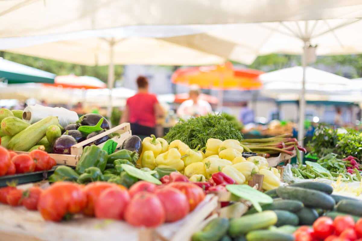 Farmers’ food market stall with variety of organic vegetable.