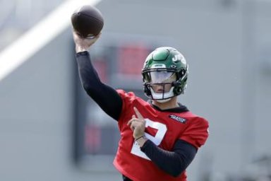 Jets quarterback Zach Wilson takes part in drills