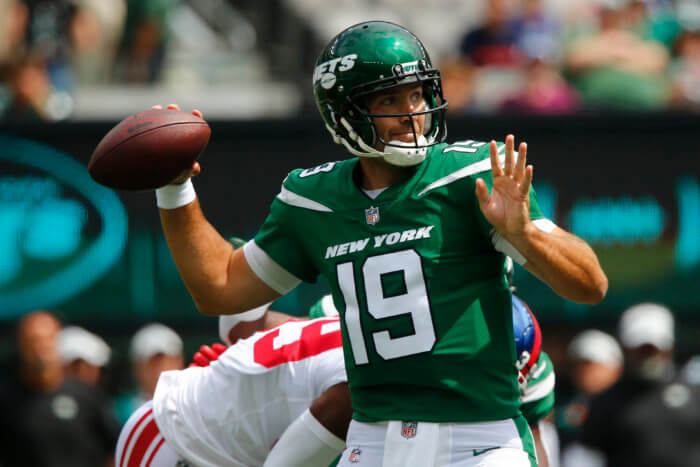 Jets quarterback Joe Flacco passes in the first half of a preseason game against the Giants.