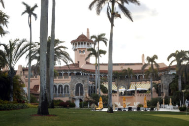 President Donald Trump's Mar-a-Lago estate is seen from the media van in the presidential motorcade in Palm Beach.