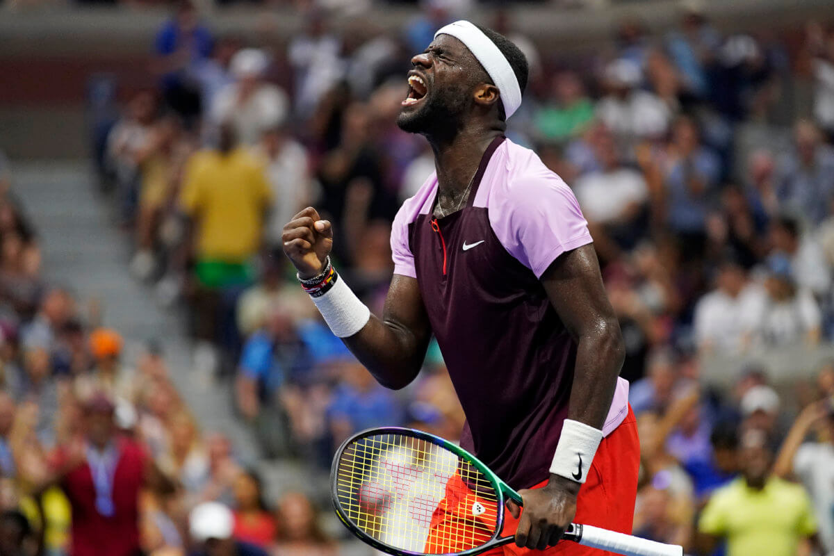 Frances Tiafoe celebrates after winning a point against Rafael Nadal during the fourth round of the US Open.