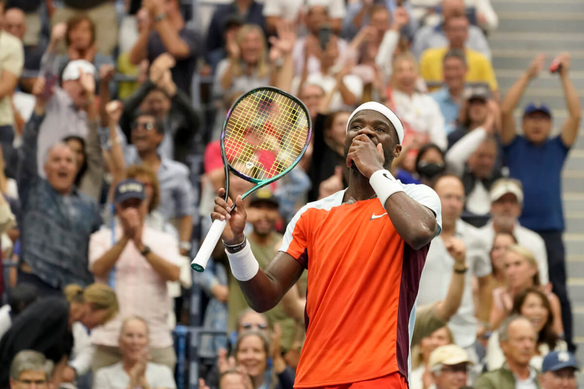 Frances Tiafoe reacts after winning a tie breaker against Andrey Rublev during the quarterfinals of the US Open.