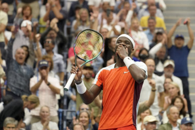 Frances Tiafoe reacts after winning a tie breaker against Andrey Rublev during the quarterfinals of the US Open.