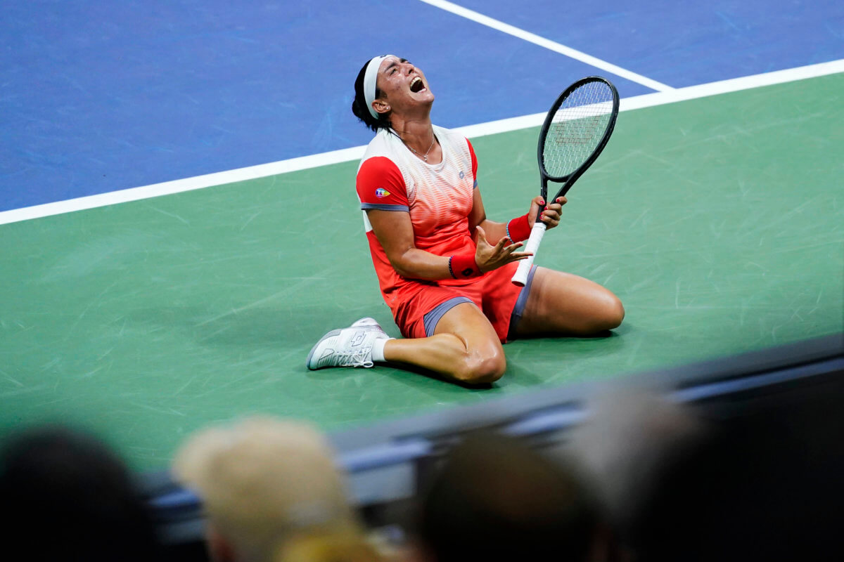 Ons Jabeur reacts after defeating Caroline Garcia in the semifinals of the US Ope.