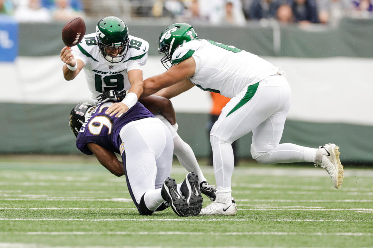 Robert Saleh is considering benching Jets quarterback Joe Flacco (19), who is seen here gettinghit by Baltimore Ravens' Calais Campbell (93) during the first half of their Week 1 game.