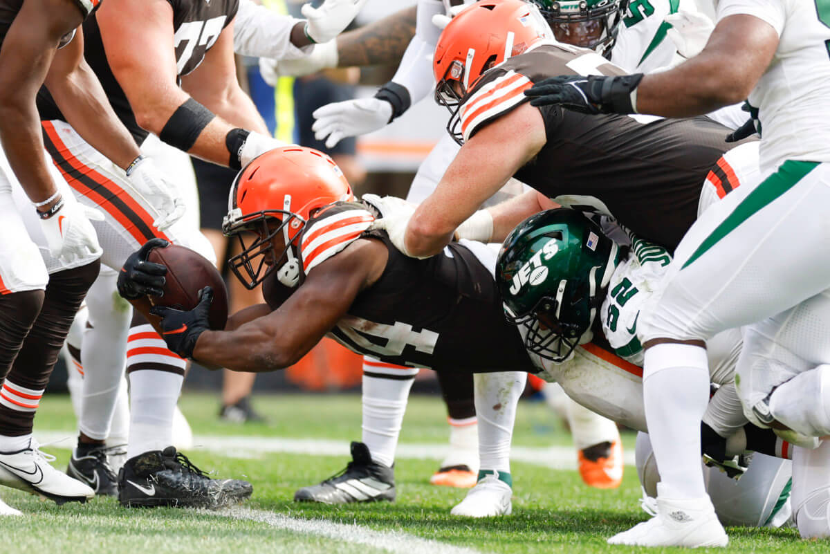 Browns running back Nick Chubb dives for a touchdown against the Jets during the second half of an NFL football game.