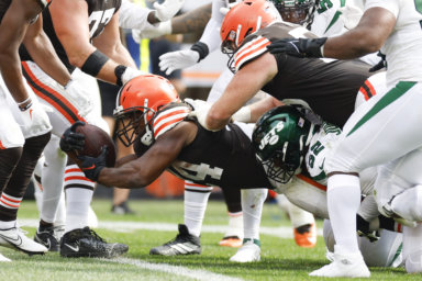 Browns running back Nick Chubb dives for a touchdown against the Jets during the second half of an NFL football game.