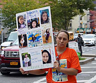 Victims families participate in the NYPD homicide memorial walk