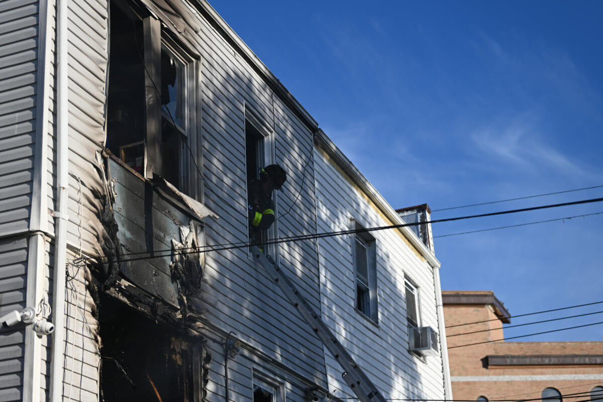 Woman rescued in Brooklyn house fire
