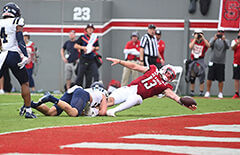 N.C. State quarterback Devin Leary scores a touchdown