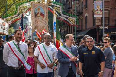 NYC Mayor Eric Adams and Manhattan Borough President Mark Levine march in the San Gennaro Grand Procession.