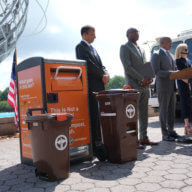 Mayor Adams stands with city officials to announce the Queens composting program