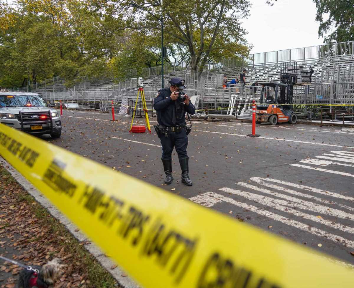 Police survey area where a bicyclist hit a Central Park jogger