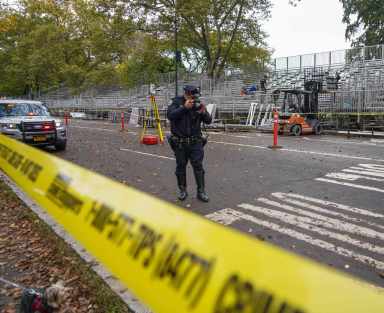 Police survey area where a bicyclist hit a Central Park jogger