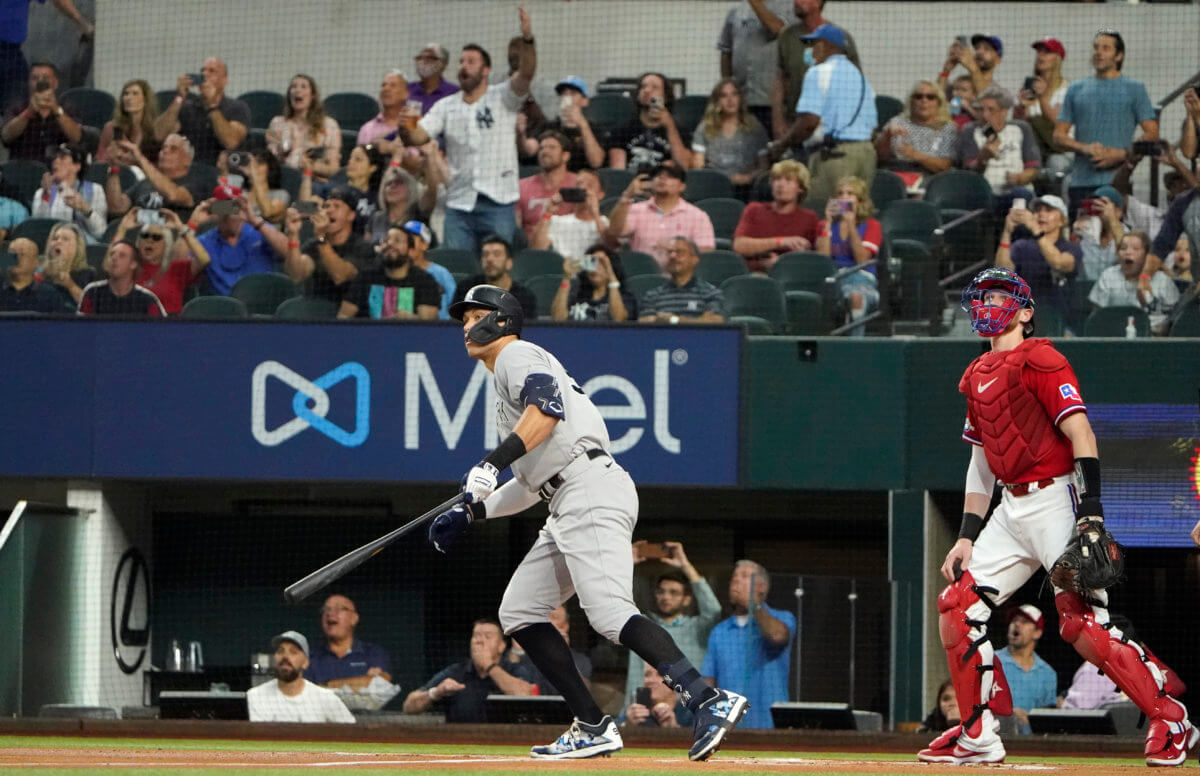 Yankees' Aaron Judge watches his solo home, his 62nd of the season.