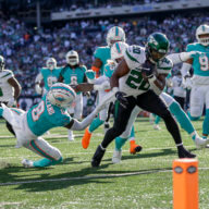 Rookie Jets running back Breece Hall carries the ball down to the 1-yard line against the Miami Dolphins.