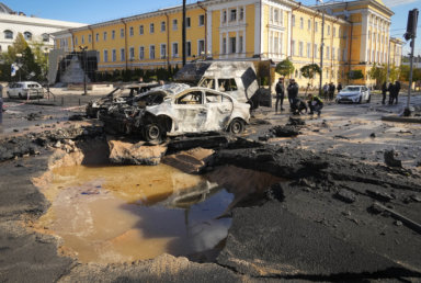 Police inspect the scene of Russian shelling in Kyiv, Ukraine, Monday, Oct. 10, 2022.