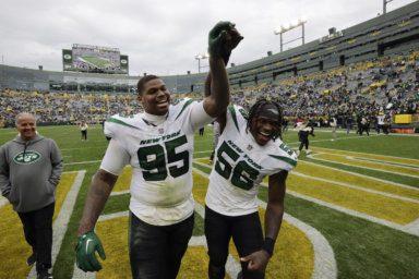 Jets defensive tackle Quinnen Williams (left) and linebacker Quincy Williams walk off the field after the Jets beat the Packers in Week 6.