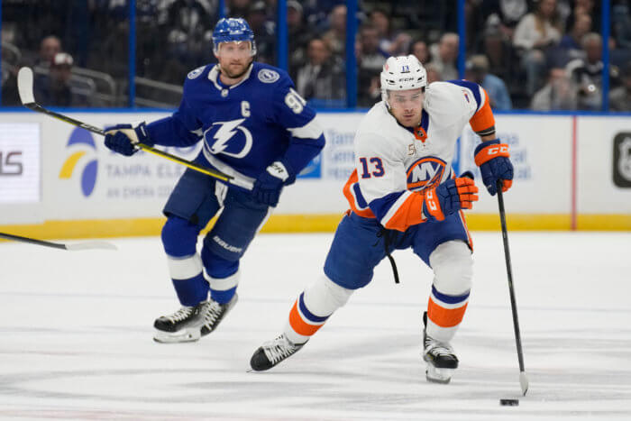 New York Islanders center Mathew Barzal (13) wears a Hockey Fights Cancer  jersey as he warms up before an NHL hockey game against the Florida  Panthers, Saturday, Nov. 9, 2019, in New