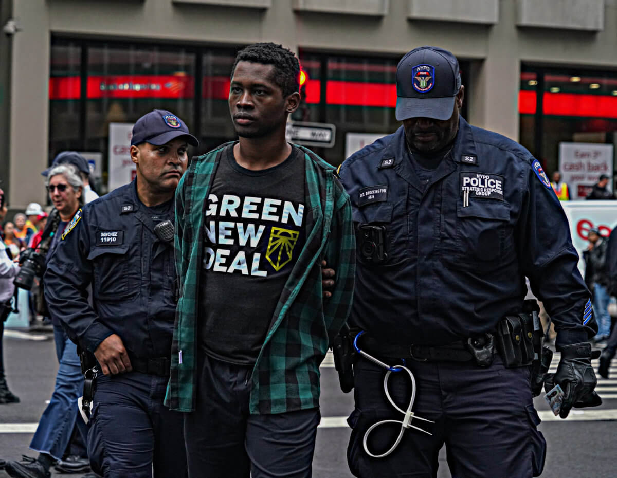 Climate activists arrested for blocking Midtown street.