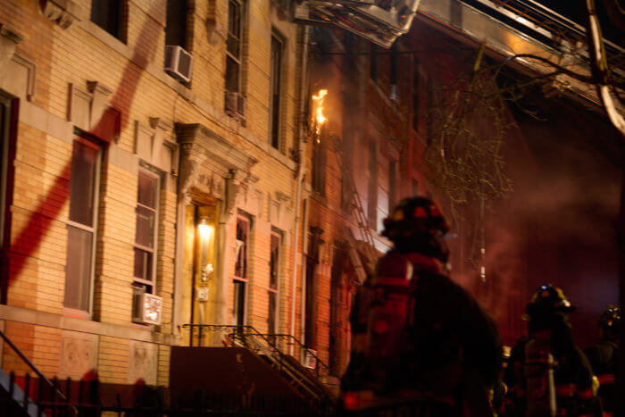 Eight people injured in four-alarm Queens apartment building fire
