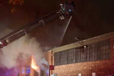 Four-alarm fire guts Queens warehouse