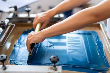 Close up of screen printing on shirts and textiles.