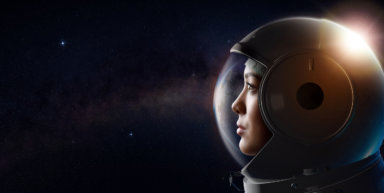Portrait of female cosmonaut in the outer space.