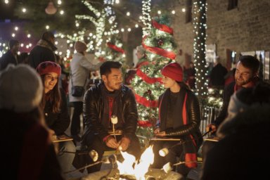 Alex Vallari Jr and Vanessa Marano as sit together in One Delicious Christmas