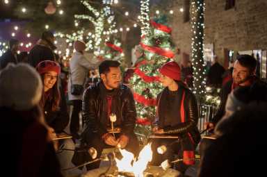 Alex Vallari Jr and Vanessa Marano as sit together in One Delicious Christmas
