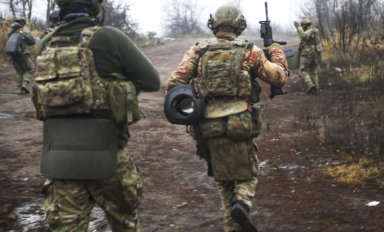 Ukrainian soldiers change their position at an undisclosed location in the Donetsk region
