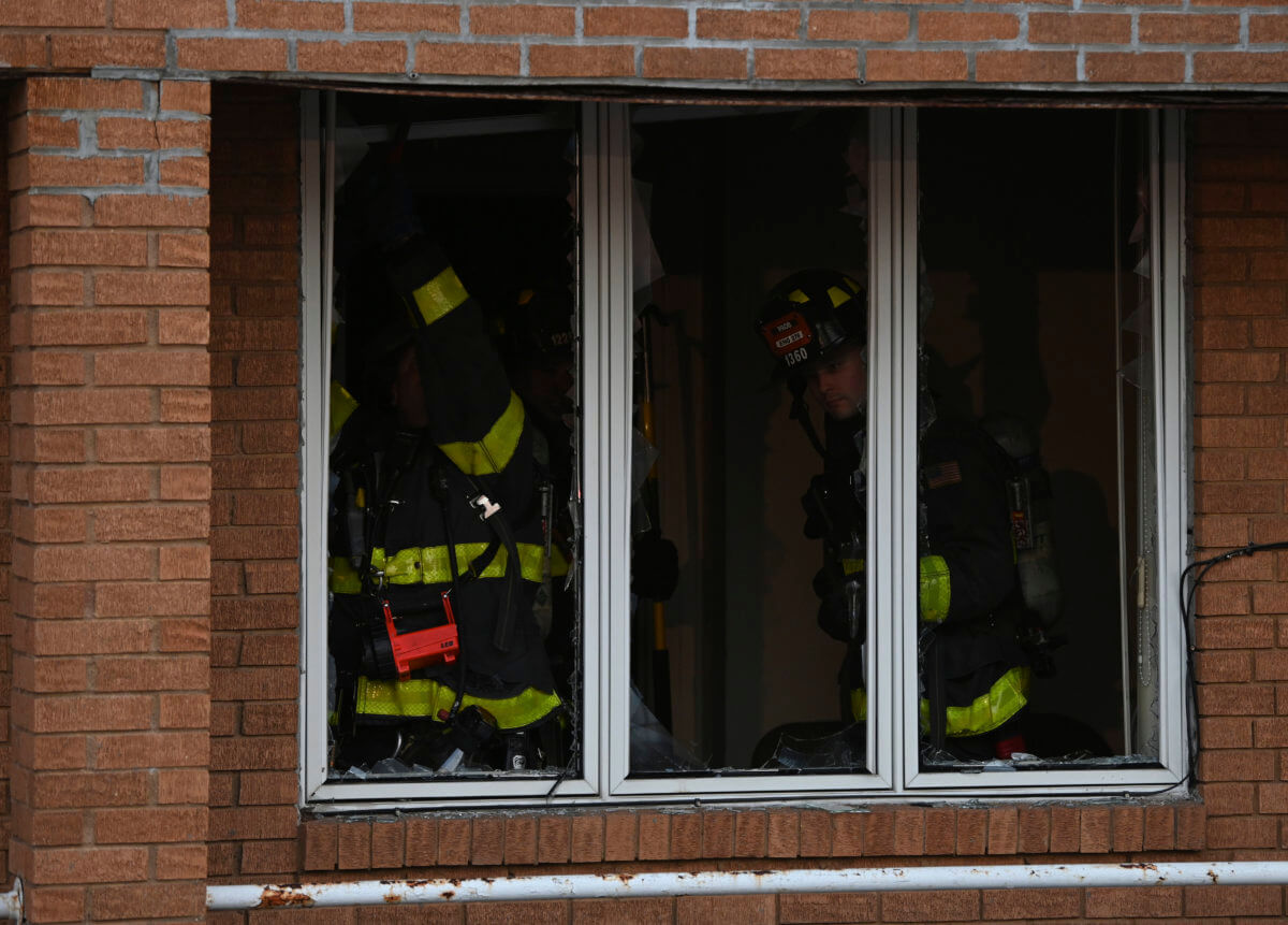 Firefighters at the scene of a Brooklyn fire