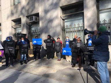 Protestors in lower Manhattan, looking to ensure proper mail delivery at Rikers Island.